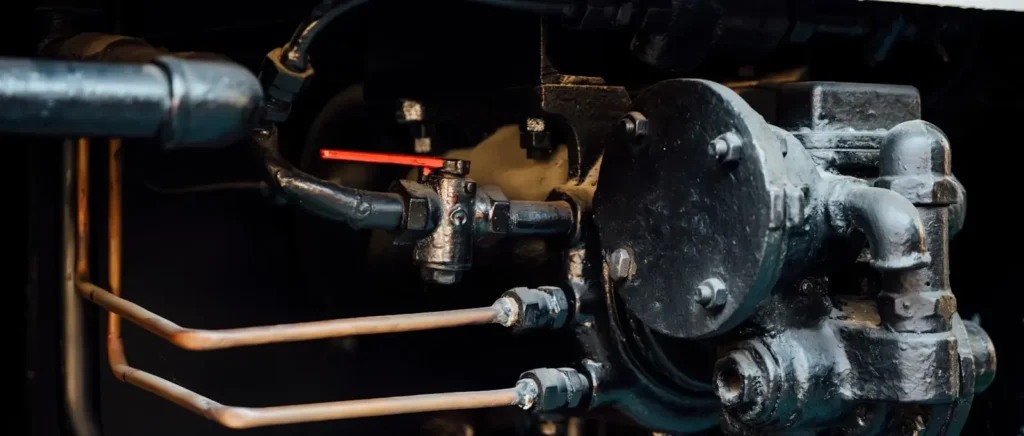 A close up of a machine with pipes