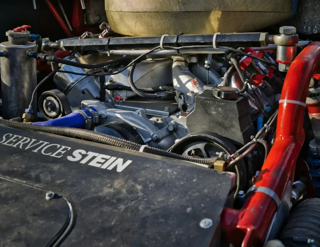 An engine bay of a vehicle is displayed.