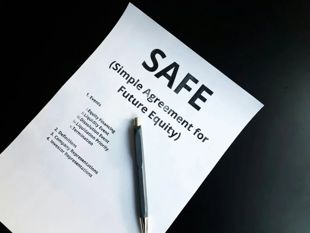a pen sitting on top of a piece of paper